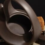 宜兴紫砂壶 | 曲壶提梁_泥料：紫泥_容量：260cc