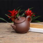 宜兴紫砂壶 | 醒狮_泥料：紫泥_容量：450cc